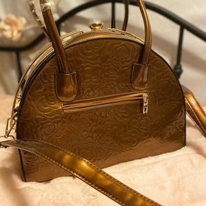 Bronze Floral Embossed Purse with Diamond snap.